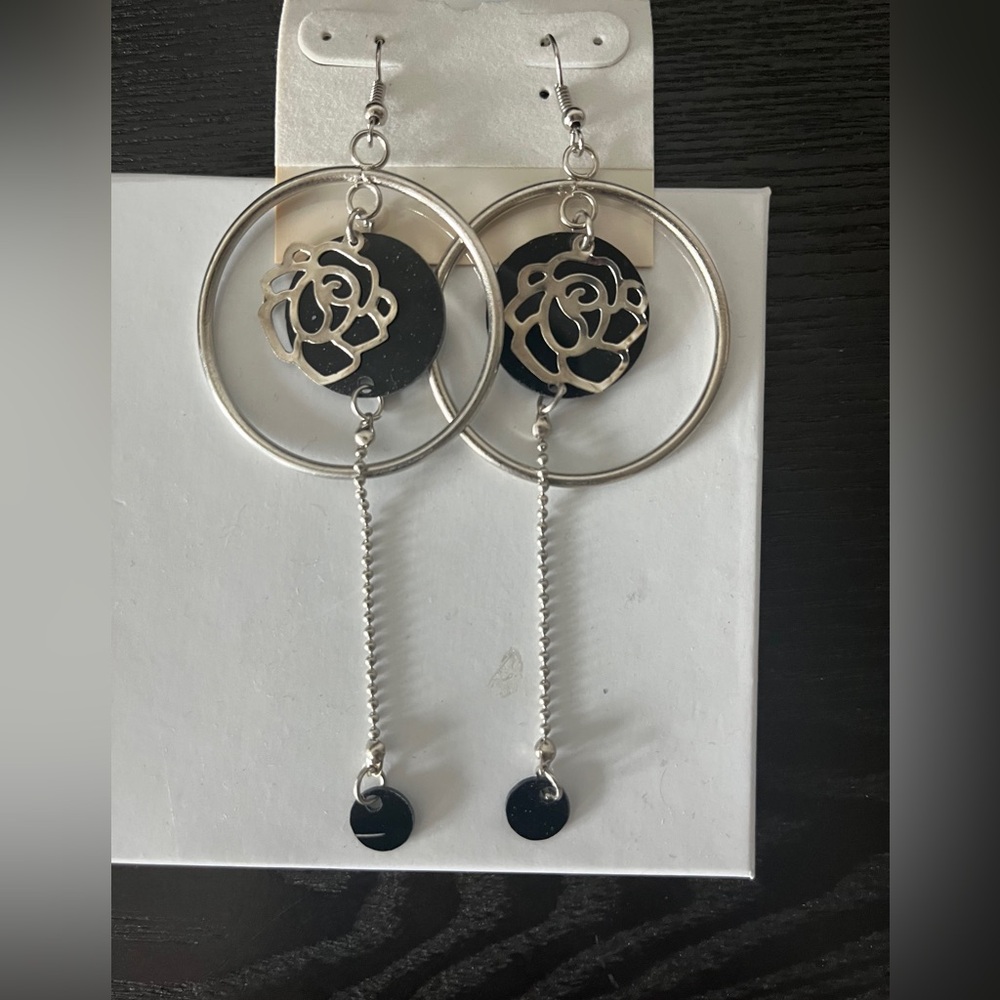 Silver earrings.